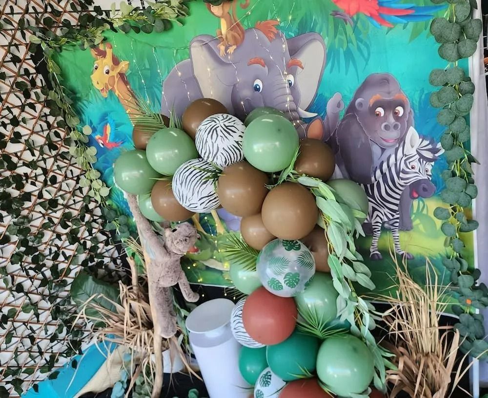 Jungle-themed Party Decoration With Balloons, Animal Cutouts, and Greenery — Creative Events Innisfail in Innisfail, QLD