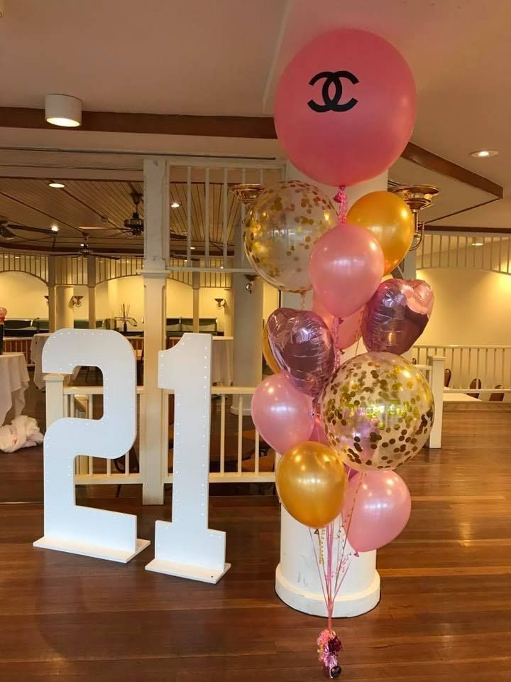 A 21 Sign Next to a Balloon Bouquet — Creative Events Innisfail in Tully, QLD