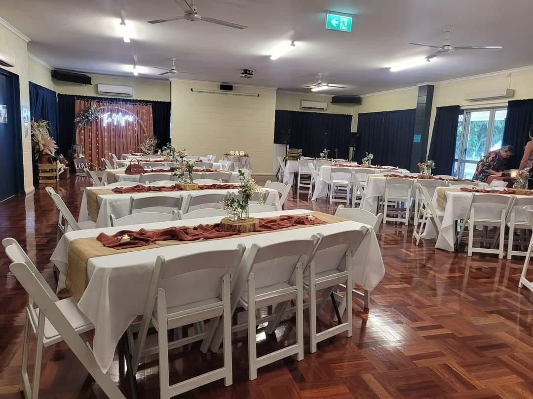 Inside of Event Space Set With White Tables, Chairs, and Decor for a Party — Creative Events Innisfail in Tully, QLD