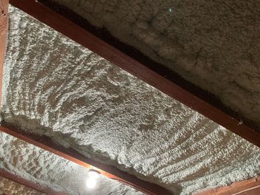 A close up of a ceiling with a lot of foam on it.