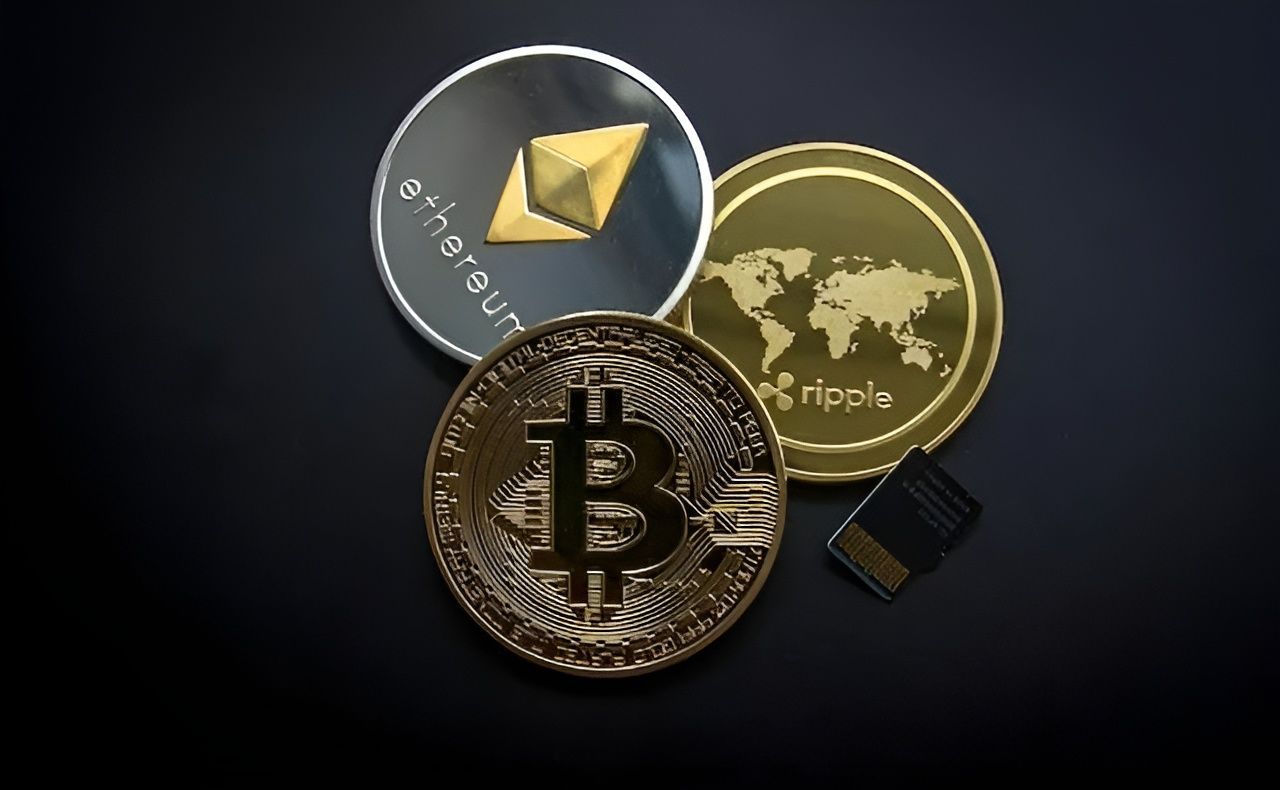 Bitcoin, Ethereum, Ripple, and A Small Black Memory Card on A Black Surface — Wright Partners in Dubbo, NSW