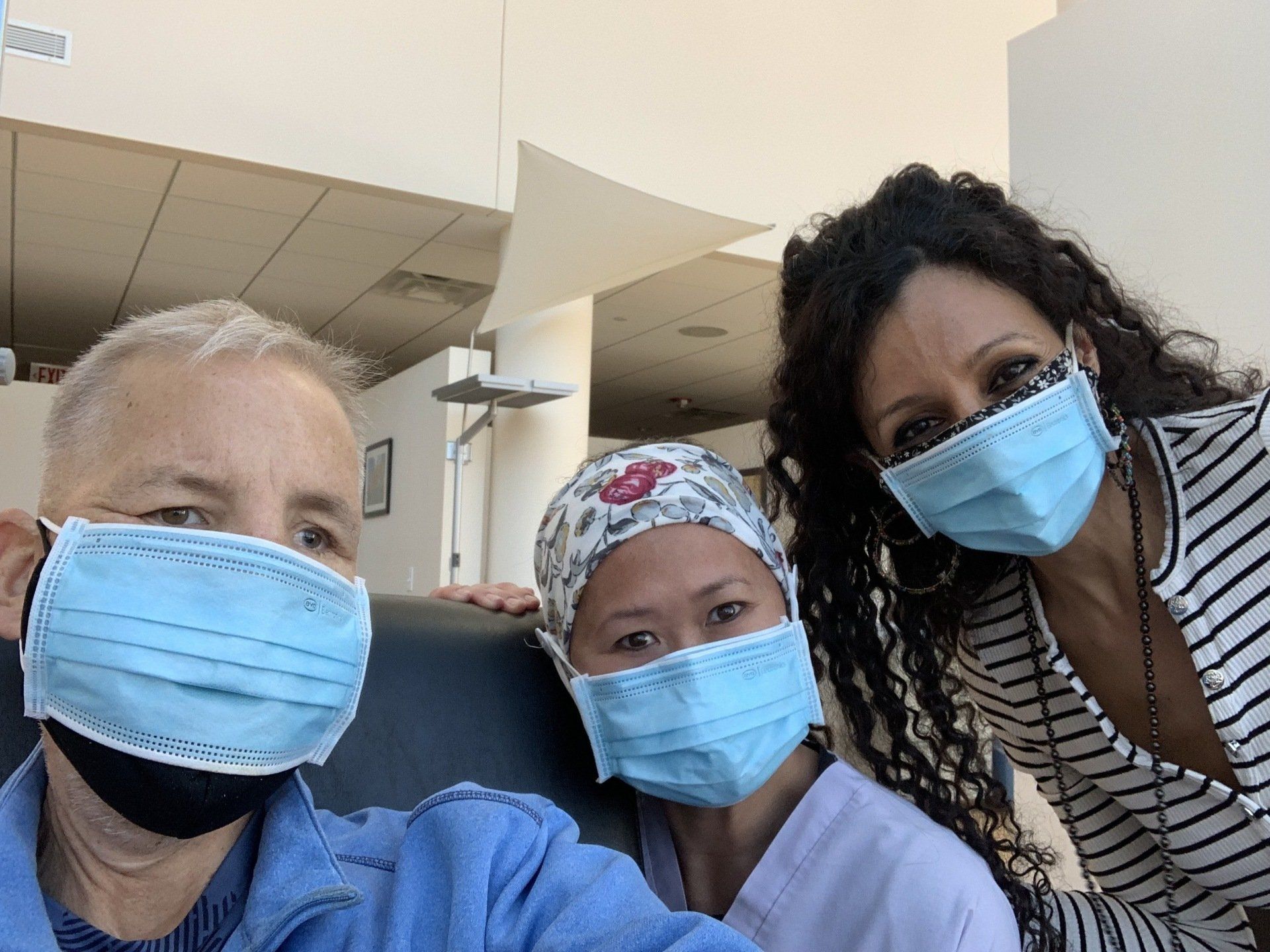 Nurse Sharon in between Dahlia and me at The Block Center