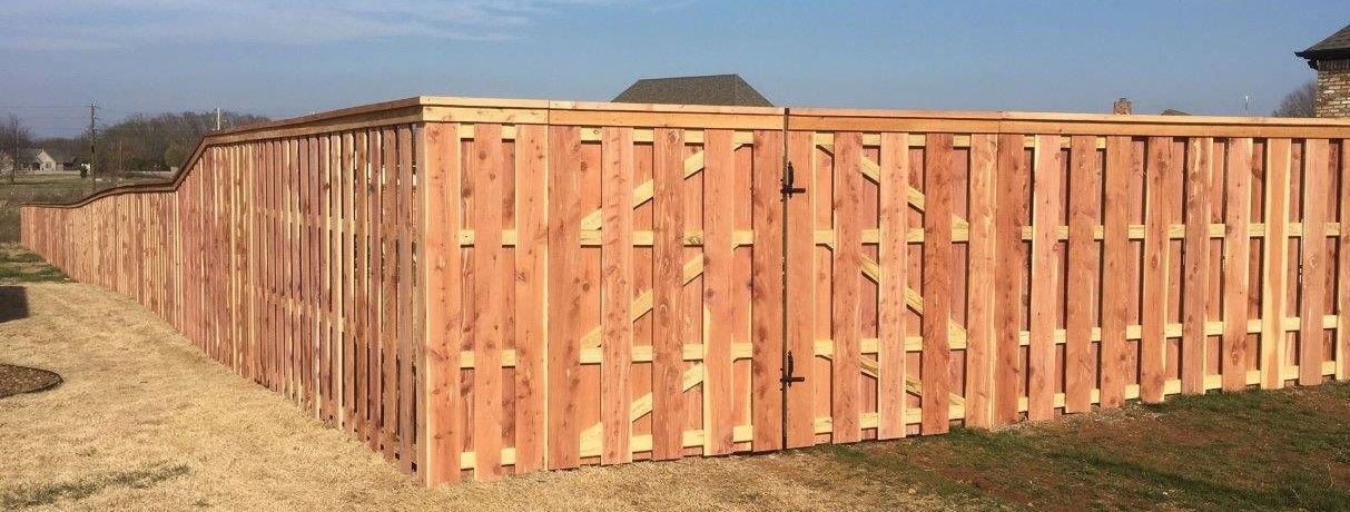 shadow box cedar fence with board on board gate with cap and trim