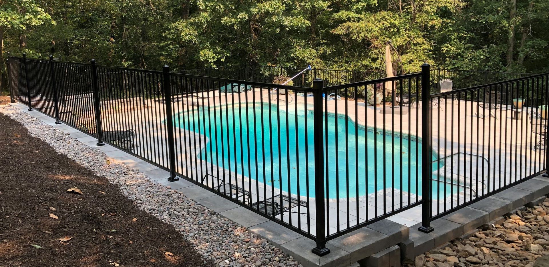 4 foot 3 rail smooth top ornamental iron pool fence installation in Northwest Arkansas