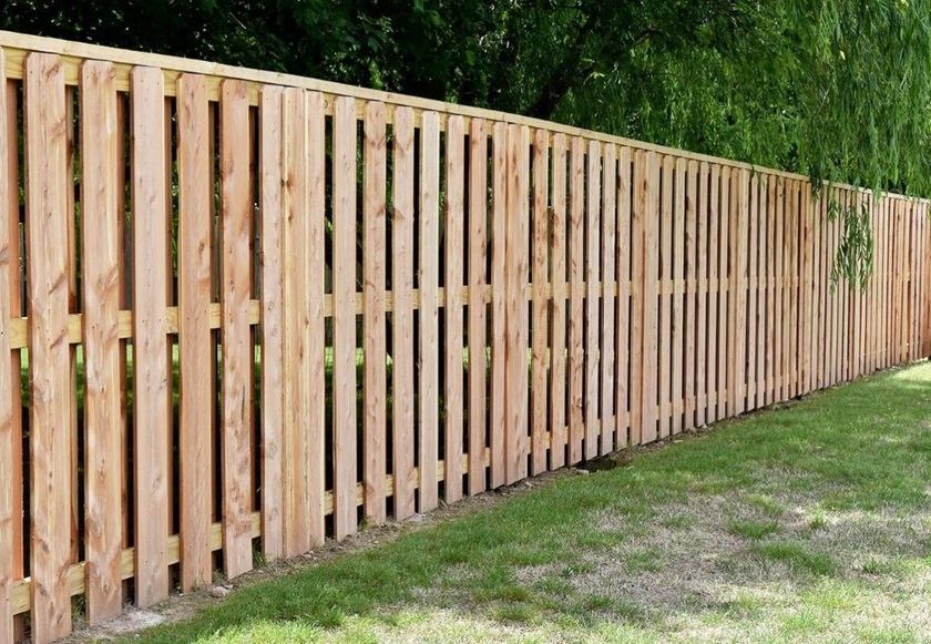 3 Rail iron fence with wood posts