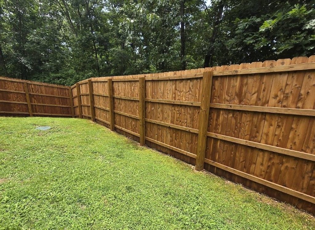 an 8ft cedar fence stained natural