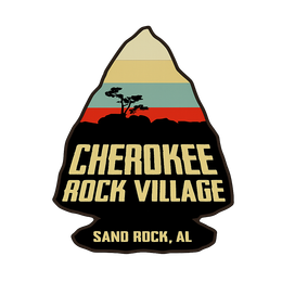 Cherokee Rock Village logo: arrowhead shape with layered mountain scene and text.