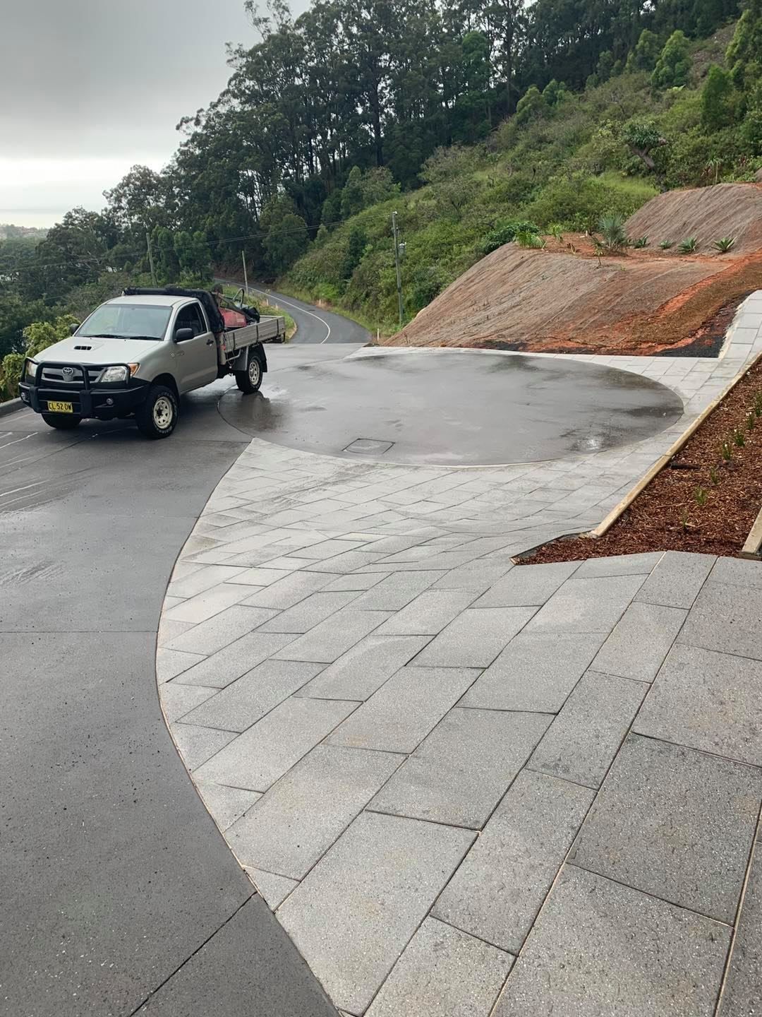A Silver Pickup Truck Parked on A Driveway — Creative Landscapes Coffs Harbour in Sandy Beach, NSW