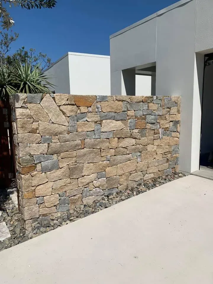 A Modern Home Exterior Featuring a Rustic Dry-Stacked Stone — Creative Landscapes Coffs Harbour in Korora, NSW