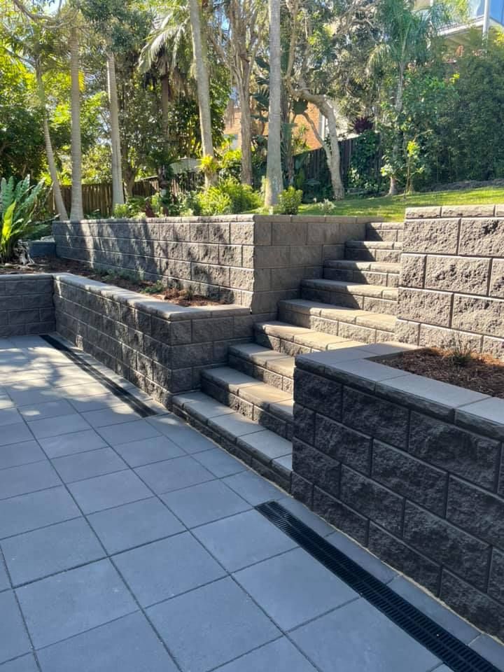 A Landscape with Grey Stone Retaining Walls — Creative Landscapes Coffs Harbour in Bonville, NSW