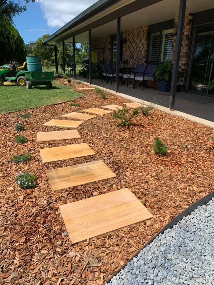 A Curved Walkway of Rectangular Timber Pavers  — Creative Landscapes Coffs Harbour in Korora, NSW