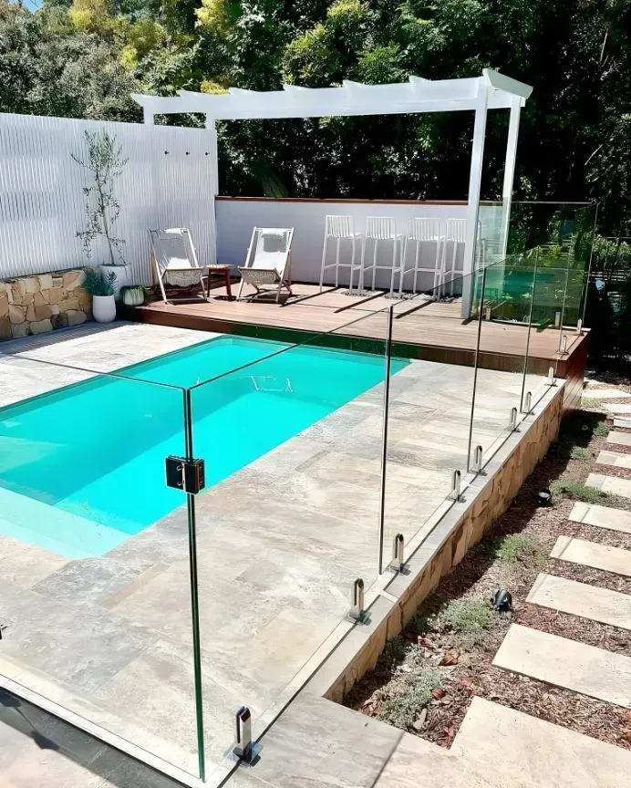 A Backyard Swimming Pool with Turquoise Water — Creative Landscapes Coffs Harbour In Toormina, NSW