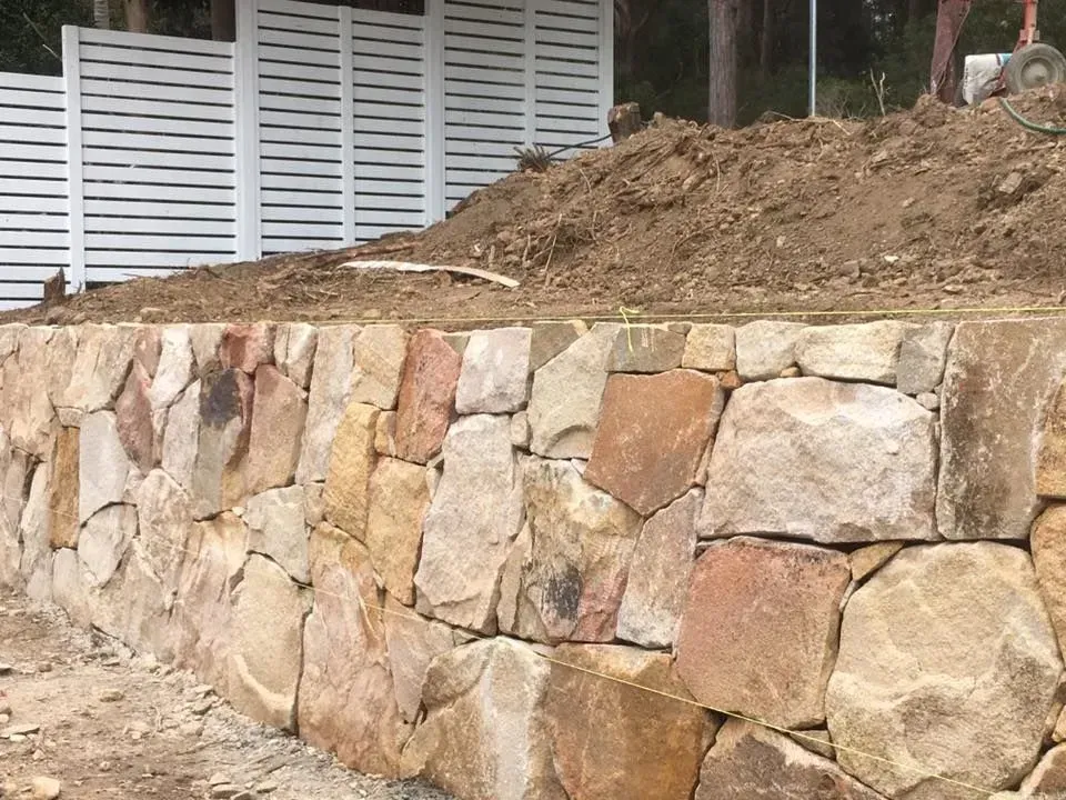 A Stone Retaining Wall — Creative Landscapes Coffs Harbour in Sapphire Beach, NSW