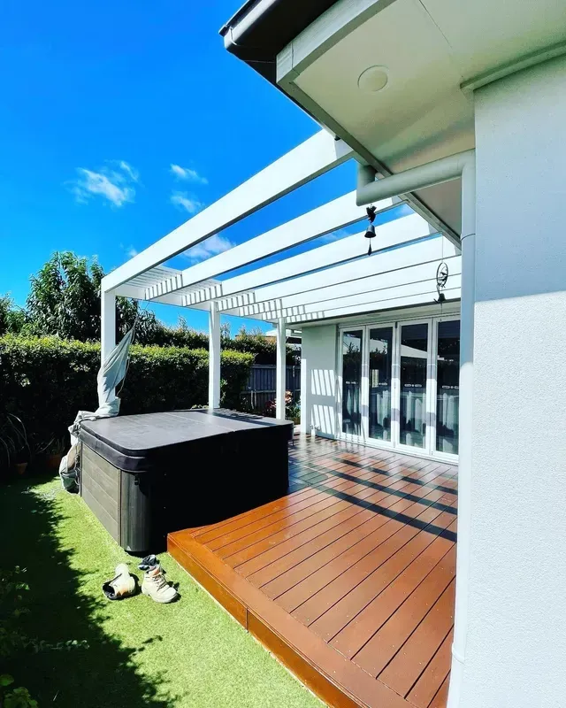 A Modern Wooden Deck with A Hot Tub — Creative Landscapes Coffs Harbour In Toormina, NSW