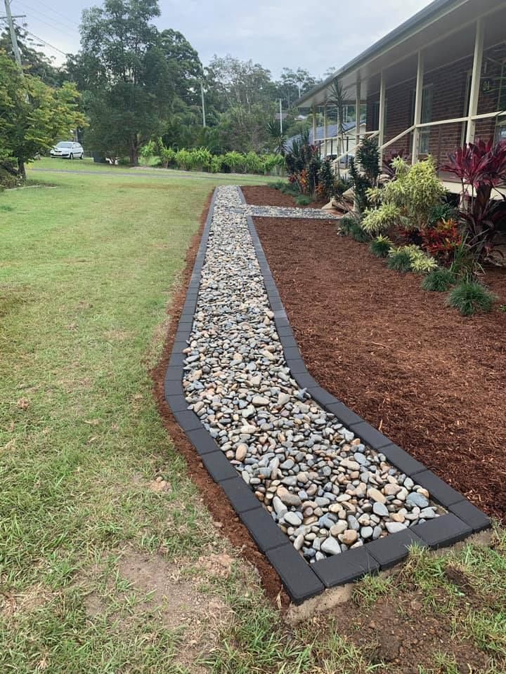 A Garden Path Made of Grey River Stones — Creative Landscapes Coffs Harbour in Korora, NSW
