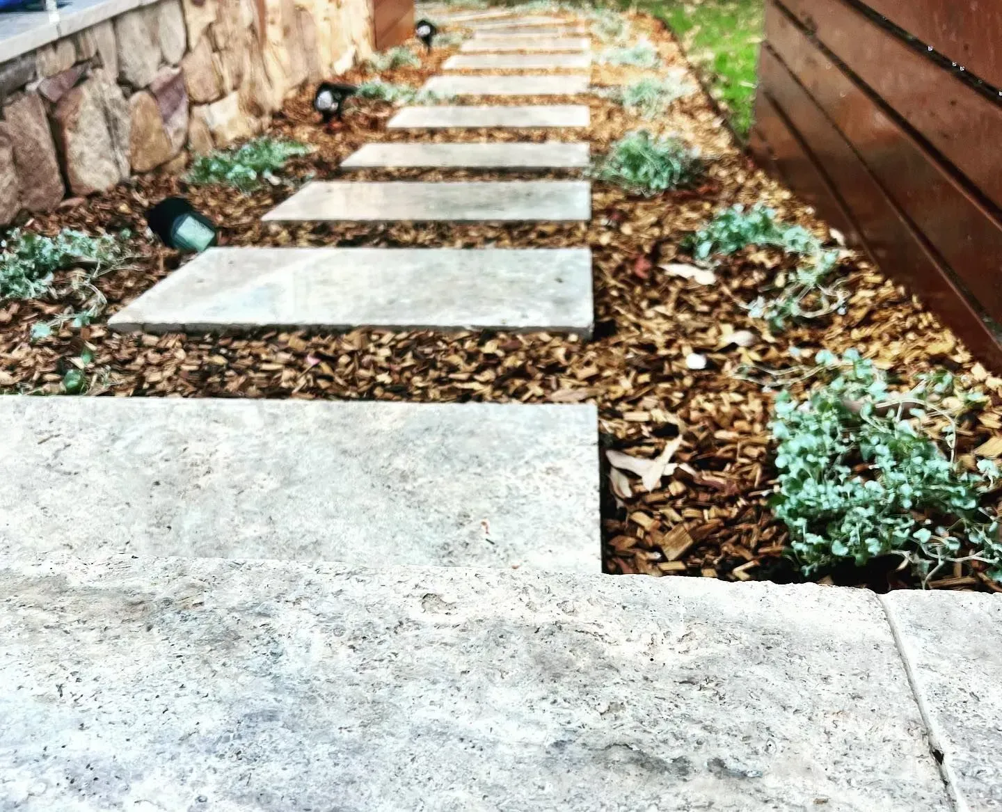 A Stone Paver Path Leads Through Mulch  — Creative Landscapes Coffs Harbour in Korora, NSW