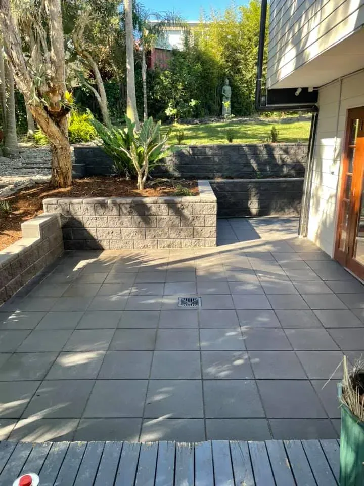 A Patio with Large Gray Tiles — Creative Landscapes Coffs Harbour in Sawtell, NSW