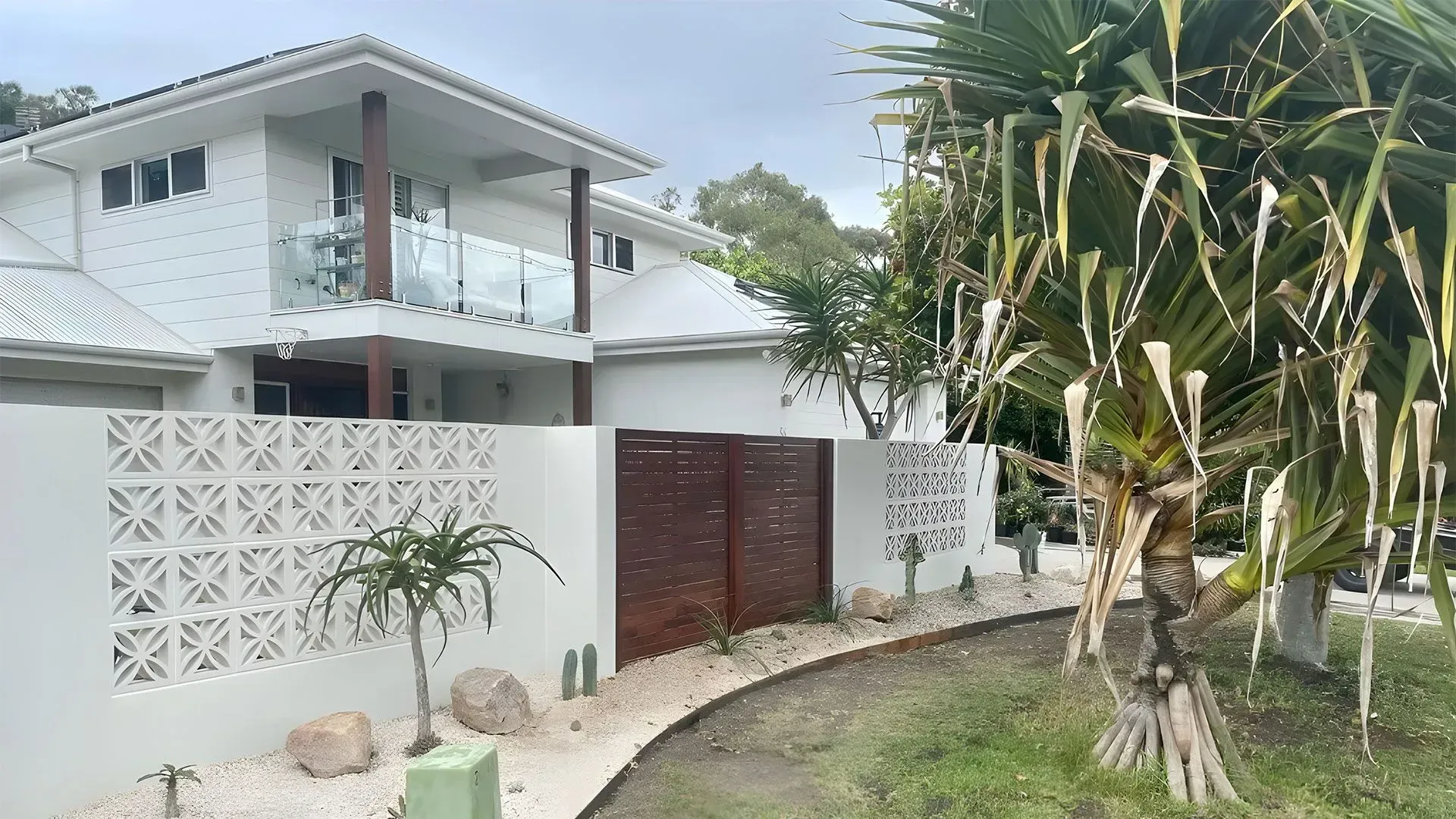 A Modern White Two-Story House  — Creative Landscapes Coffs Harbour in Korora, NSW