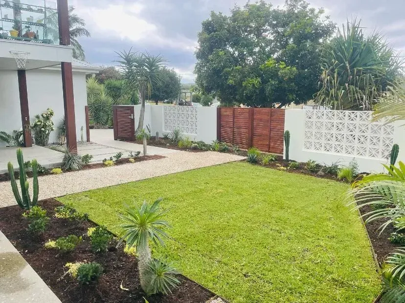 A Small, Landscaped Yard with A Manicured Green Lawn — Creative Landscapes Coffs Harbour in Korora, NSW