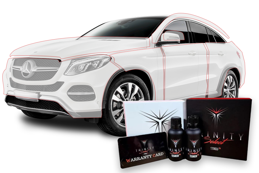 A white car is sitting next to a bottle of sb3 ceramic coating.