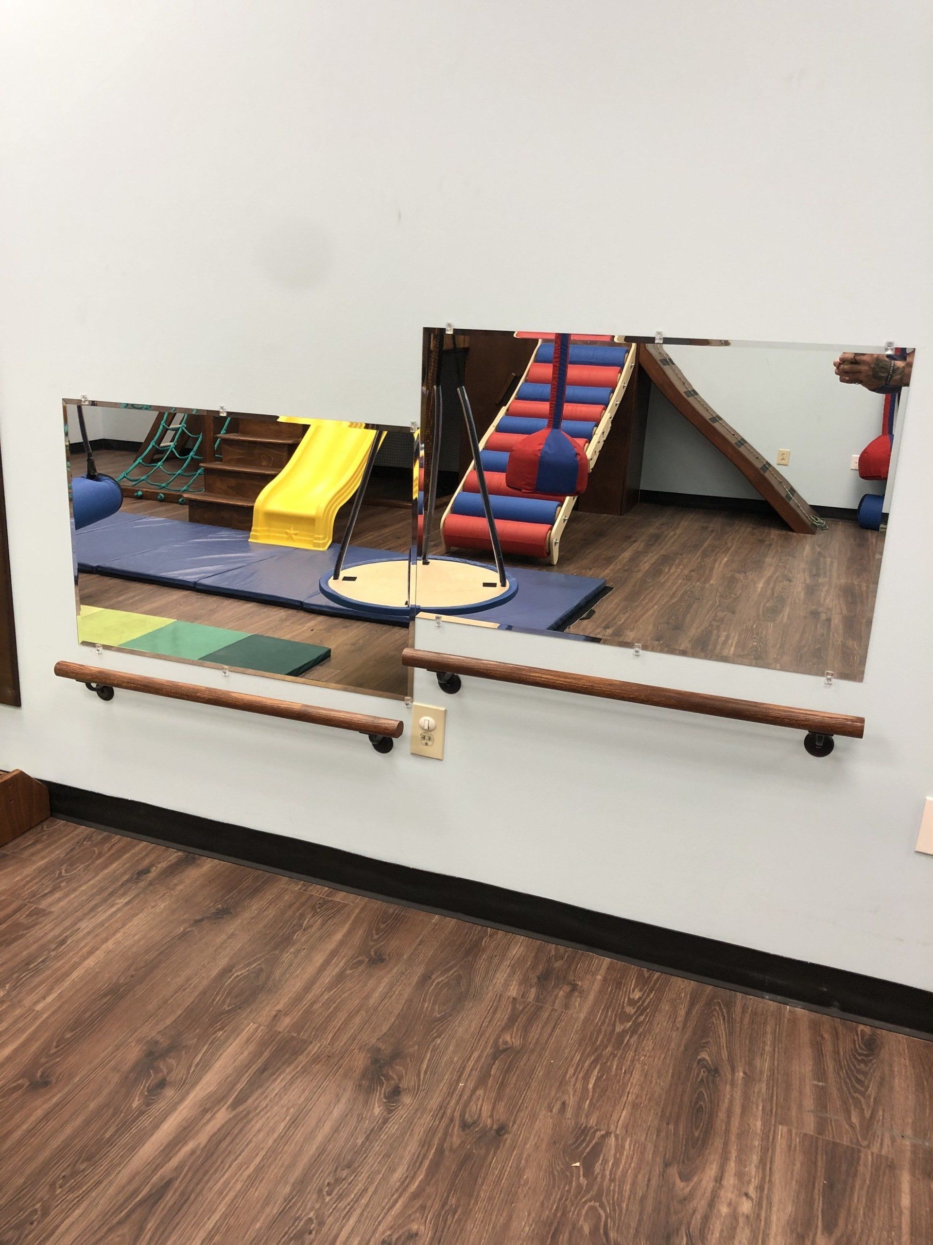 Custom sensory gym with mirror wall activity area