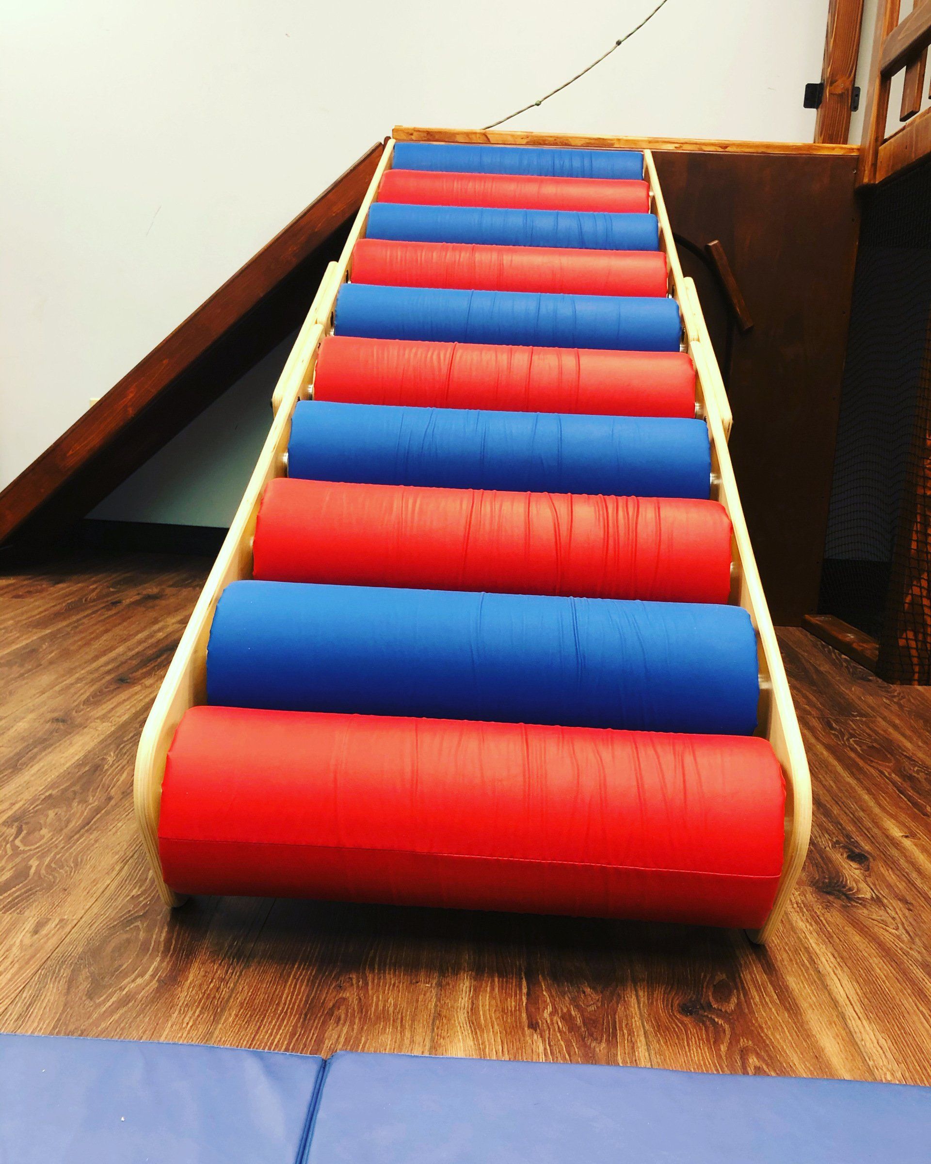 Custom padded sensory gym stairs and ramp for climbing, balance, movement, and therapy activities