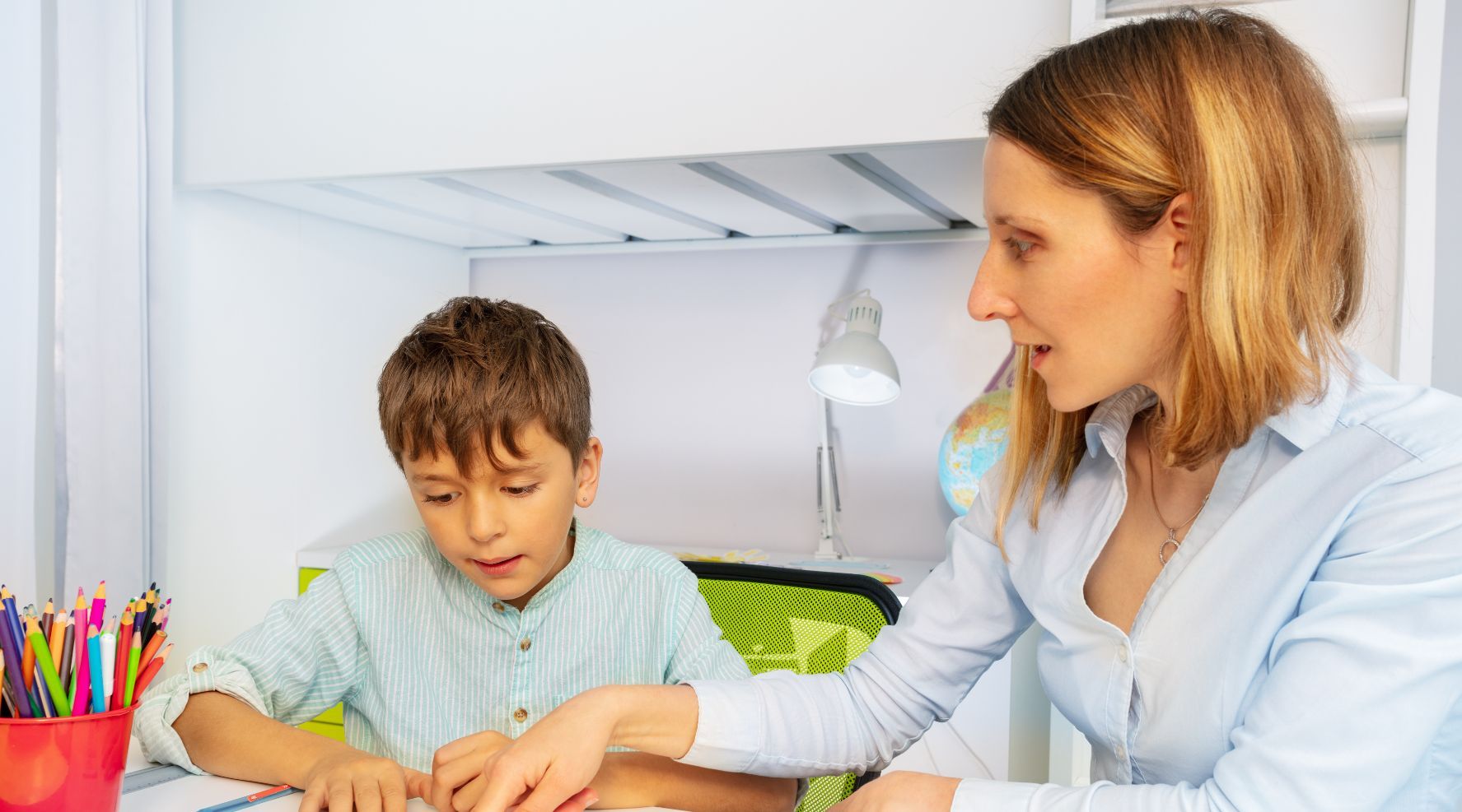 Child working with a therapist during a sensory-friendly learning and therapy activity