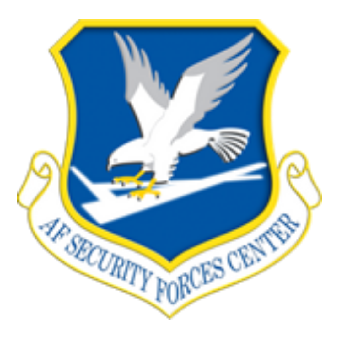 AF Security Forces Center emblem with a white eagle over a blue shield and yellow border