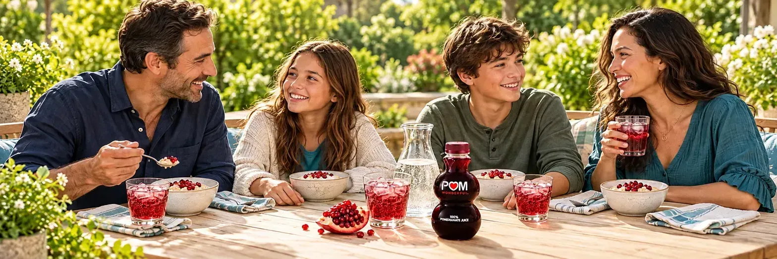 Family enjoying pomegranate oatmeal and juice spritzers outdoors