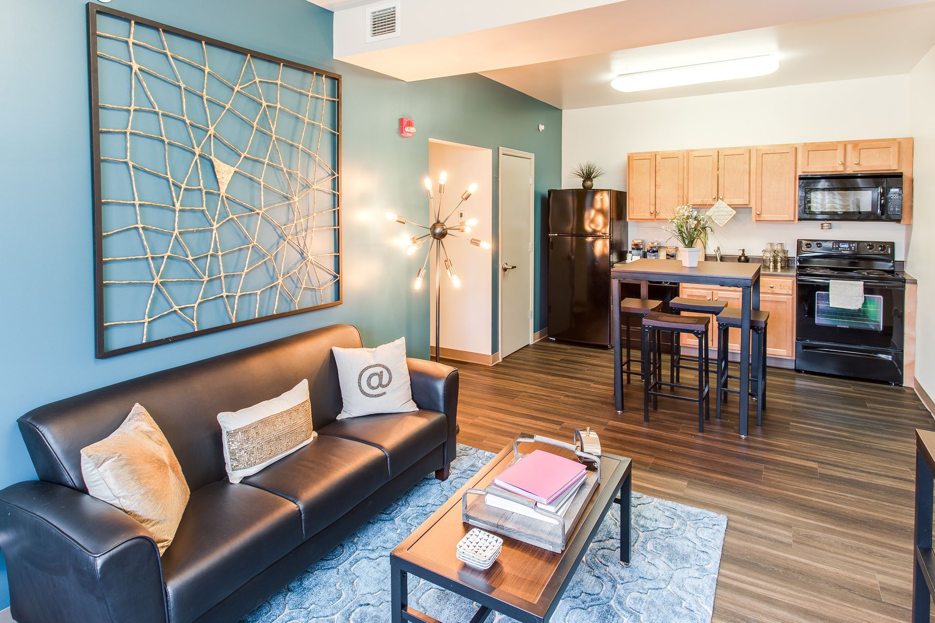 Student Housing Staged Living Room Opening to Kitchen