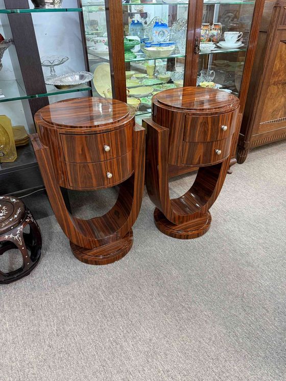A pair of Art Deco style bedside tables or side tables with a 
