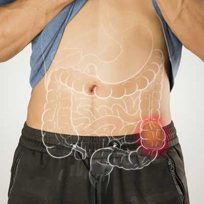 Person holding abdomen with highlighted constipation from Lower Digestive Strain
