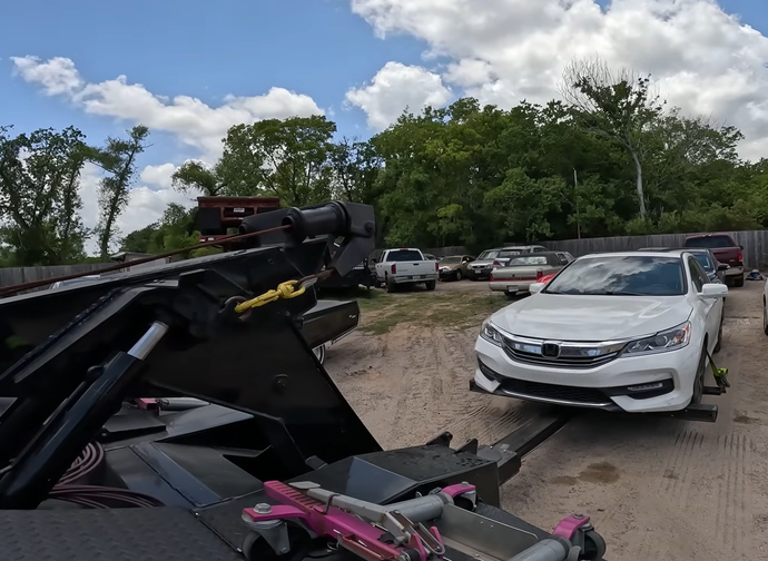 towing white car