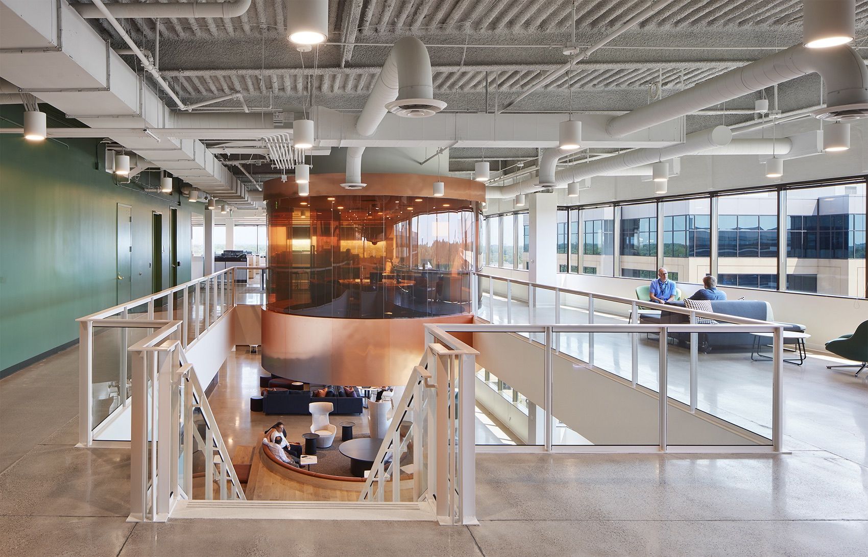 A large building with a staircase leading up to the second floor.