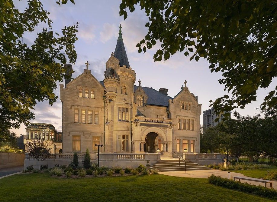 A large stone building with a tower on top of it