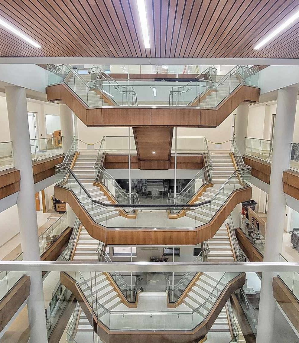 A large building with a lot of stairs and balconies.