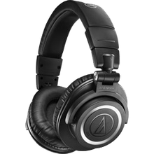Black over-ear headphones with silver accents, shown on a white background.
