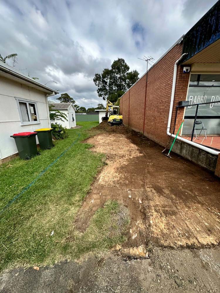 Commercial Building For Pavement Installation — About Time Plumbing & Civil Construction in Moss Vale, NSW