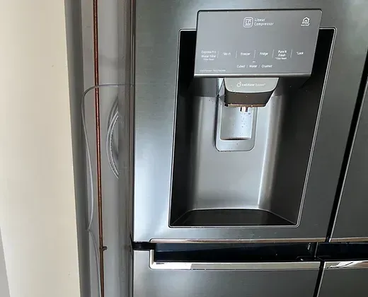 A Stainless Steel Refrigerator — About Time Plumbing & Civil Construction in Moss Vale, NSW