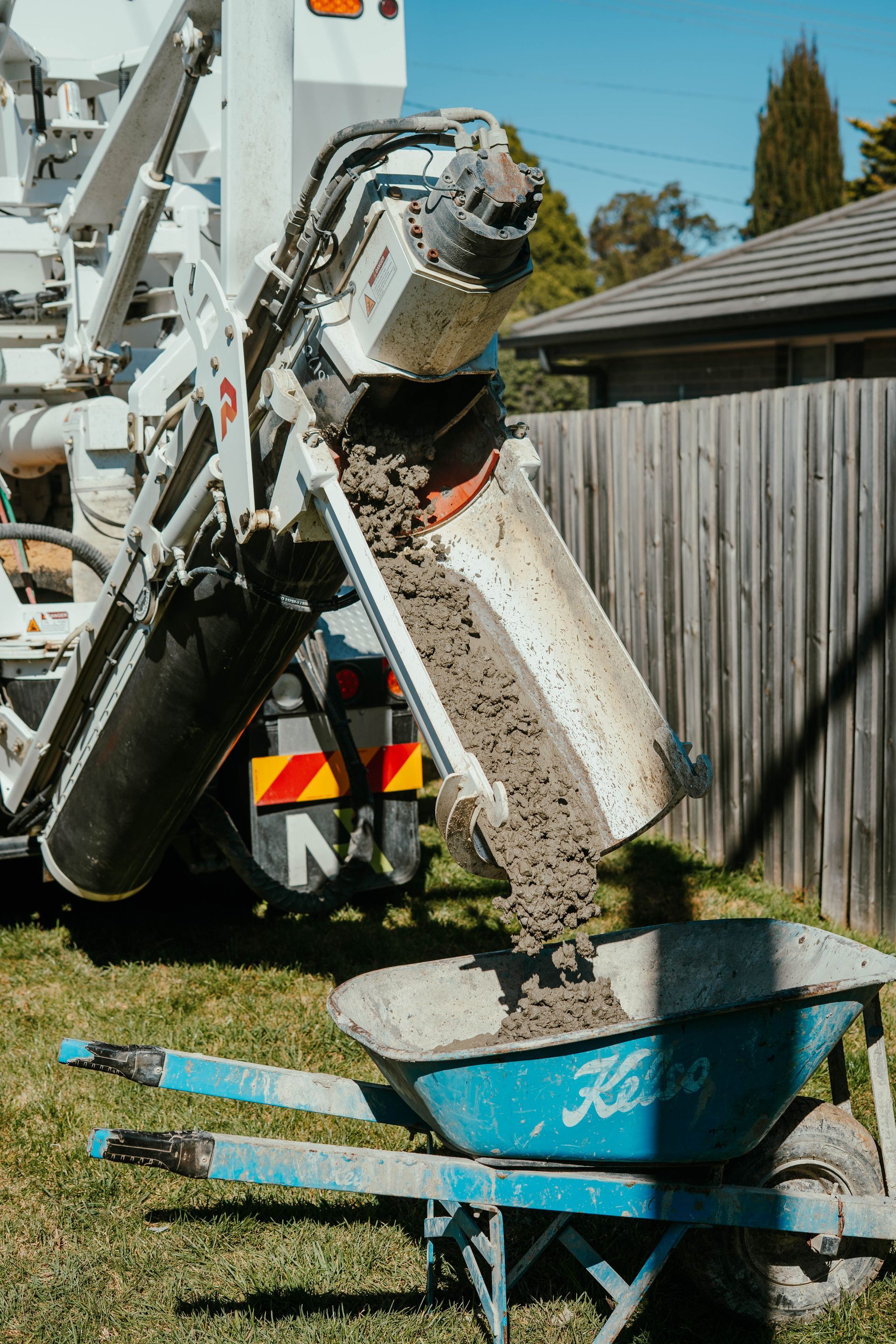 Construction Workers in Orange Safety Vests — About Time Plumbing & Civil Construction in Moss Vale, NSW