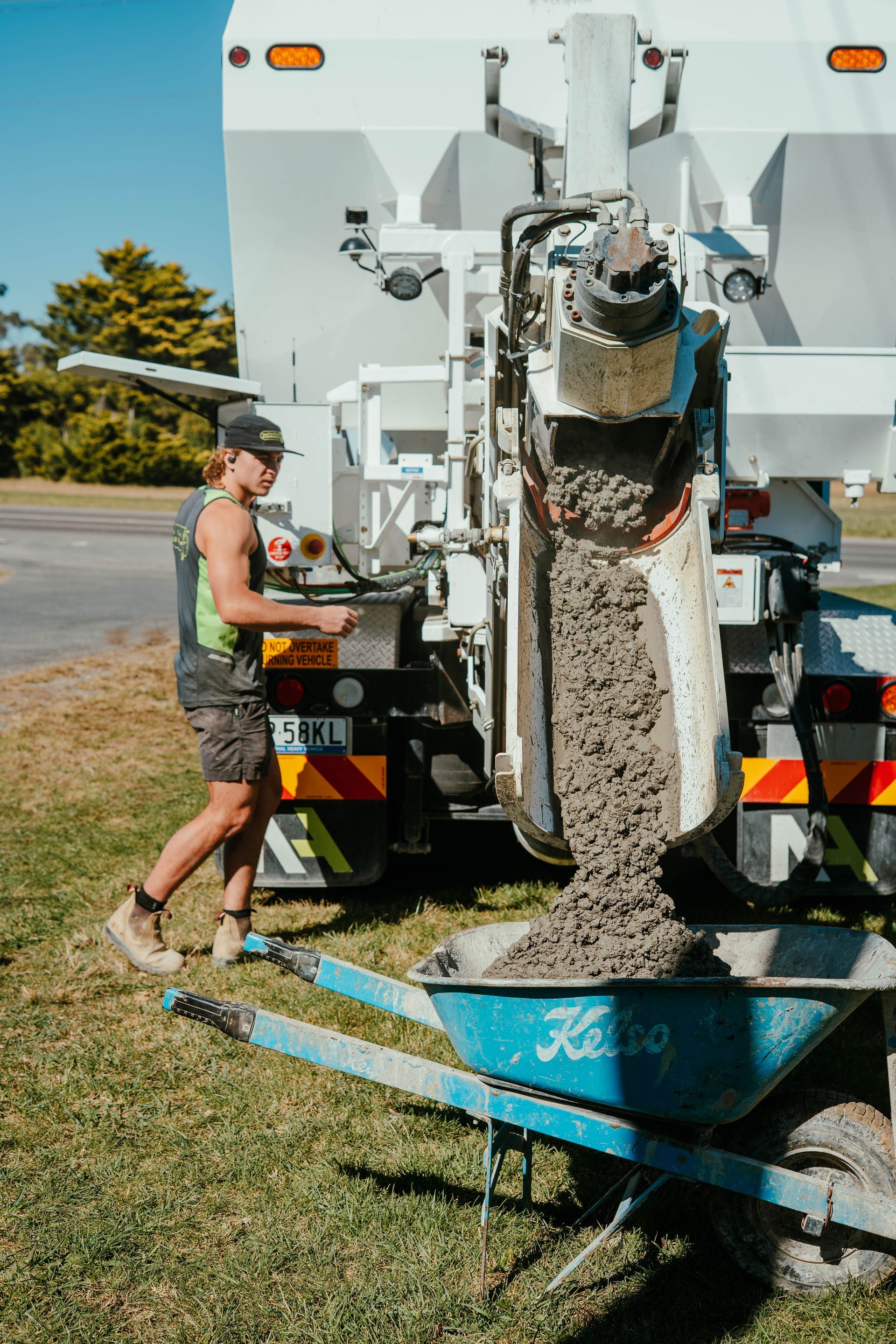 Freshly Paved Black Road With Construction — About Time Plumbing & Civil Construction in Moss Vale, NSW
