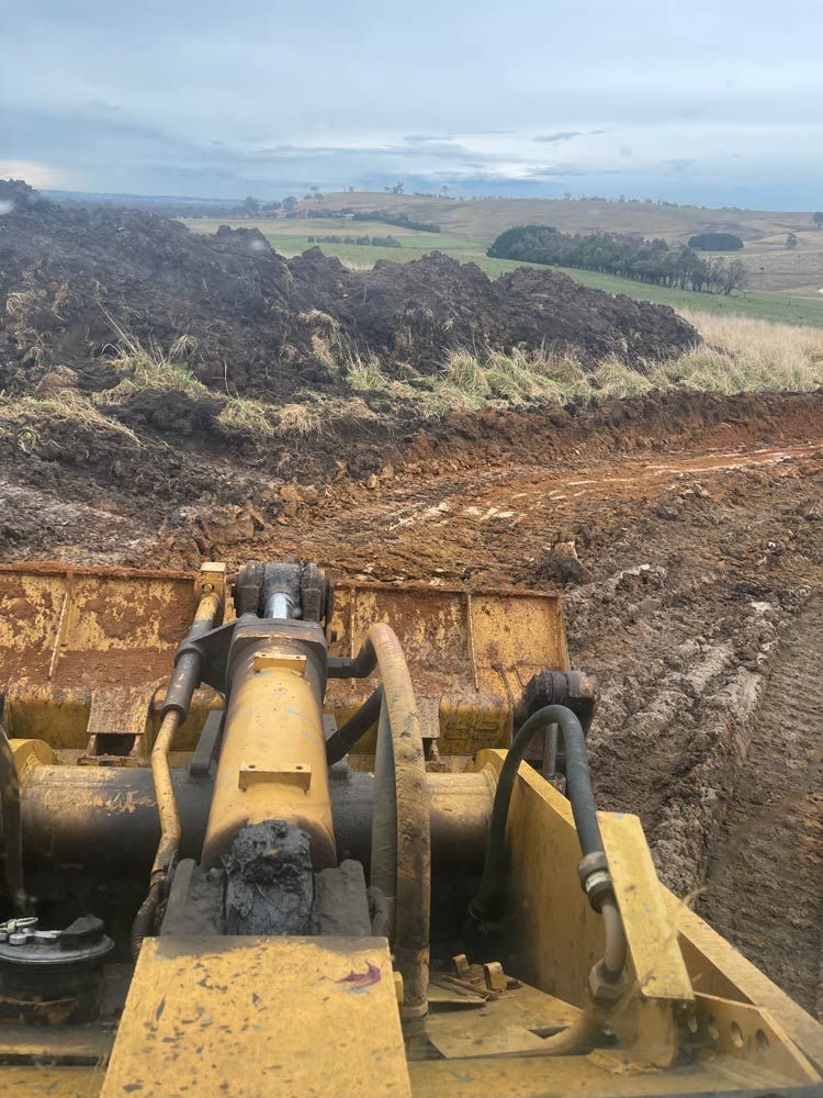 Controlling Excavator — About Time Plumbing & Civil Construction in Moss Vale, NSW