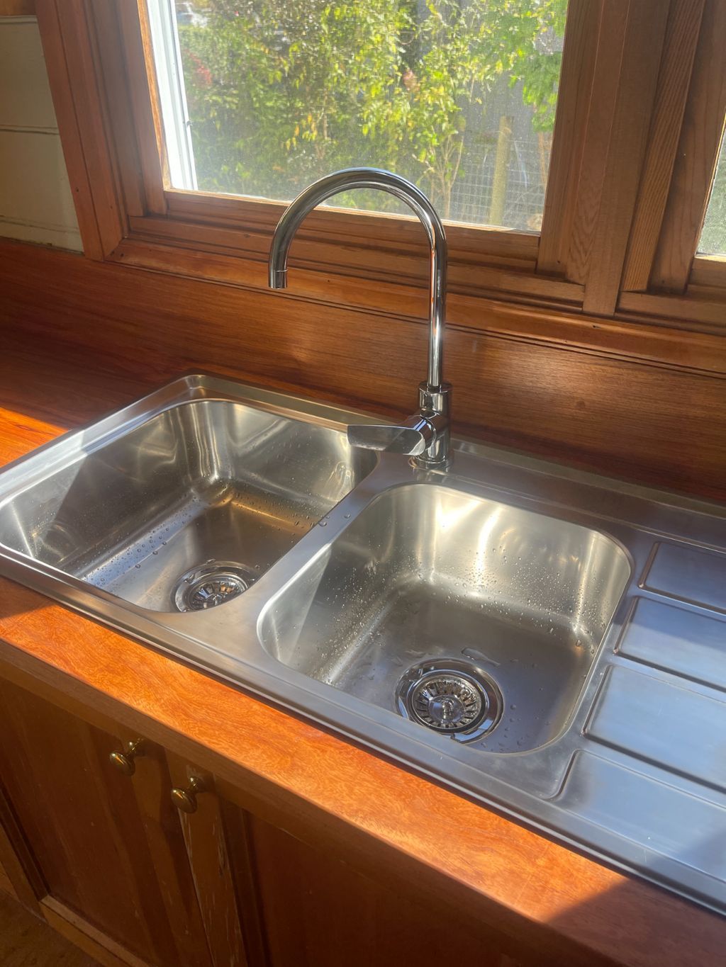 A Stainless Steel Kitchen Sink — About Time Plumbing & Civil Construction in Moss Vale, NSW