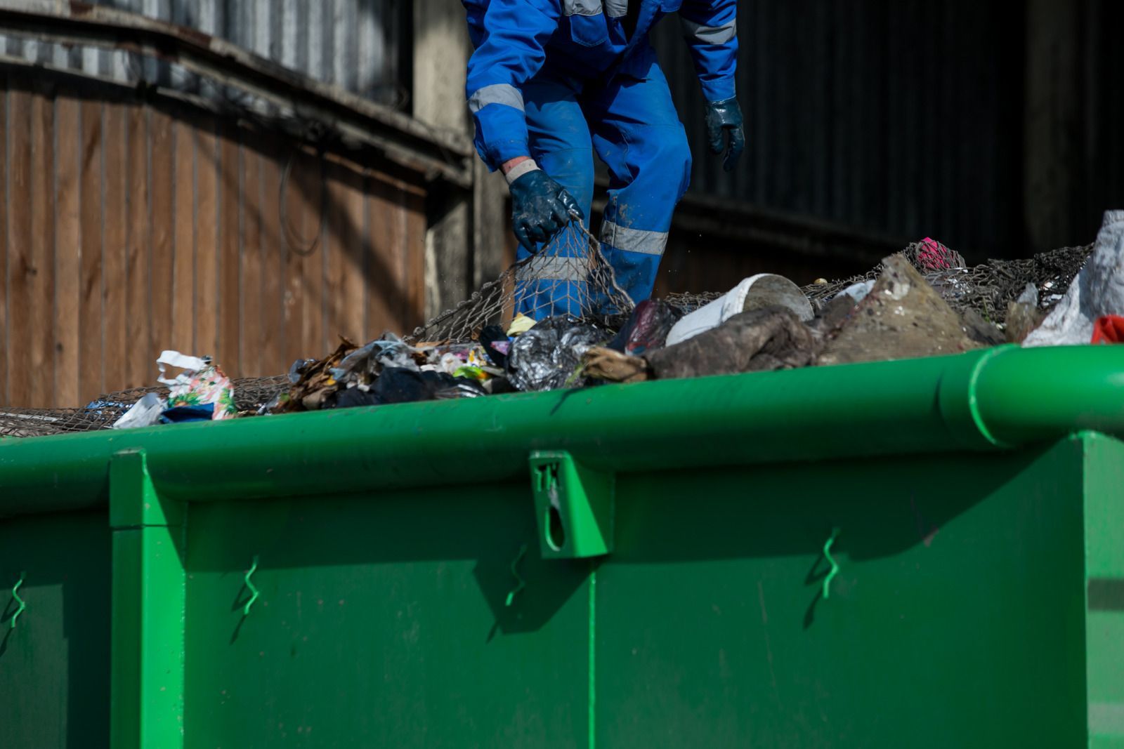 Clean Out Trash Compactor
