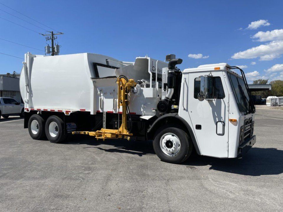 a white truck with a crane