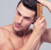 man combing his hair