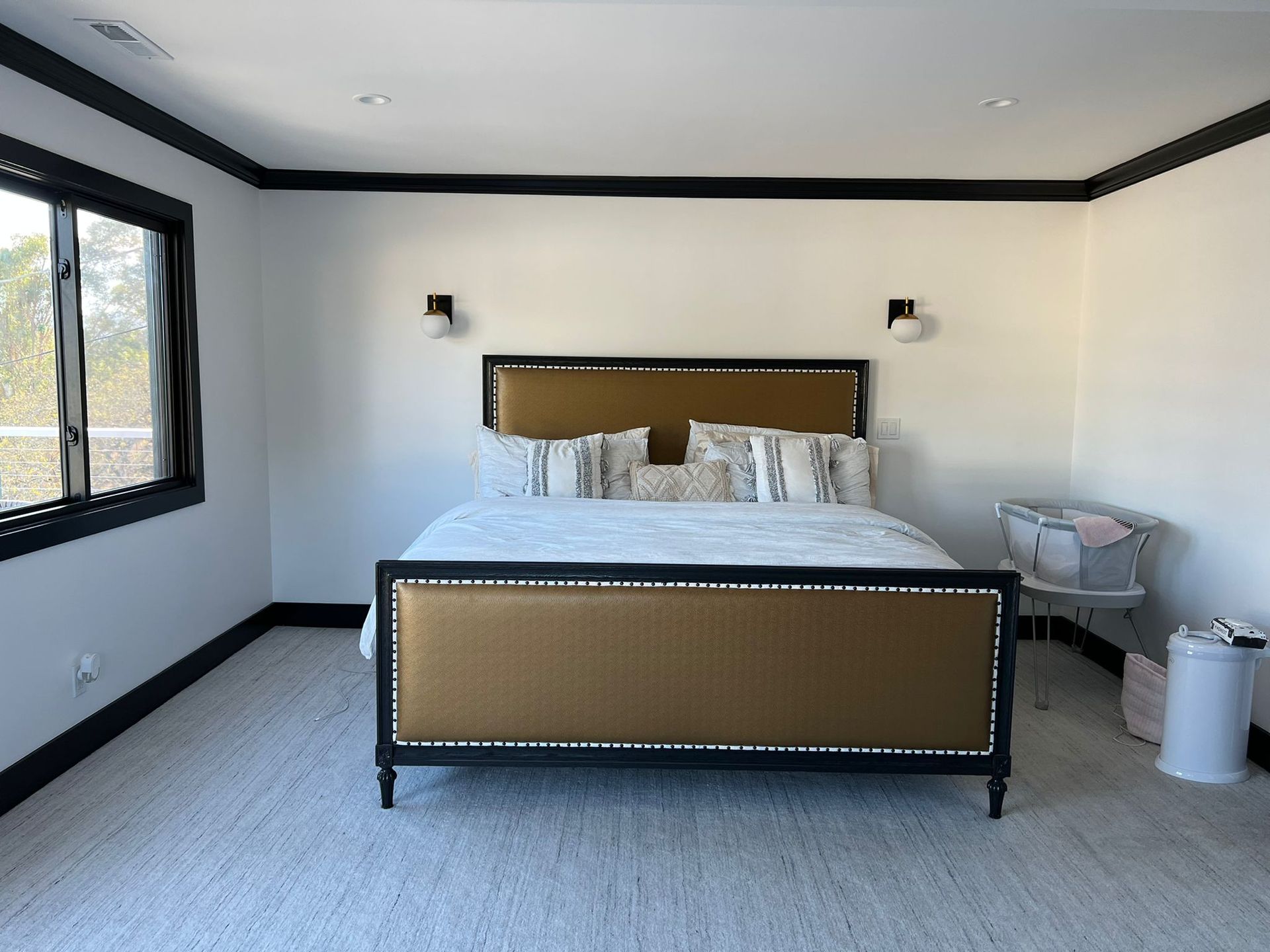 There is a large bed in the middle of the room.