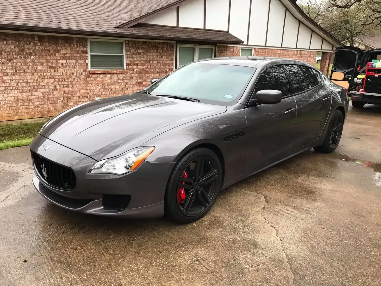 Gray luxury sedan after paint correction and ceramic coating in The Colony, TX