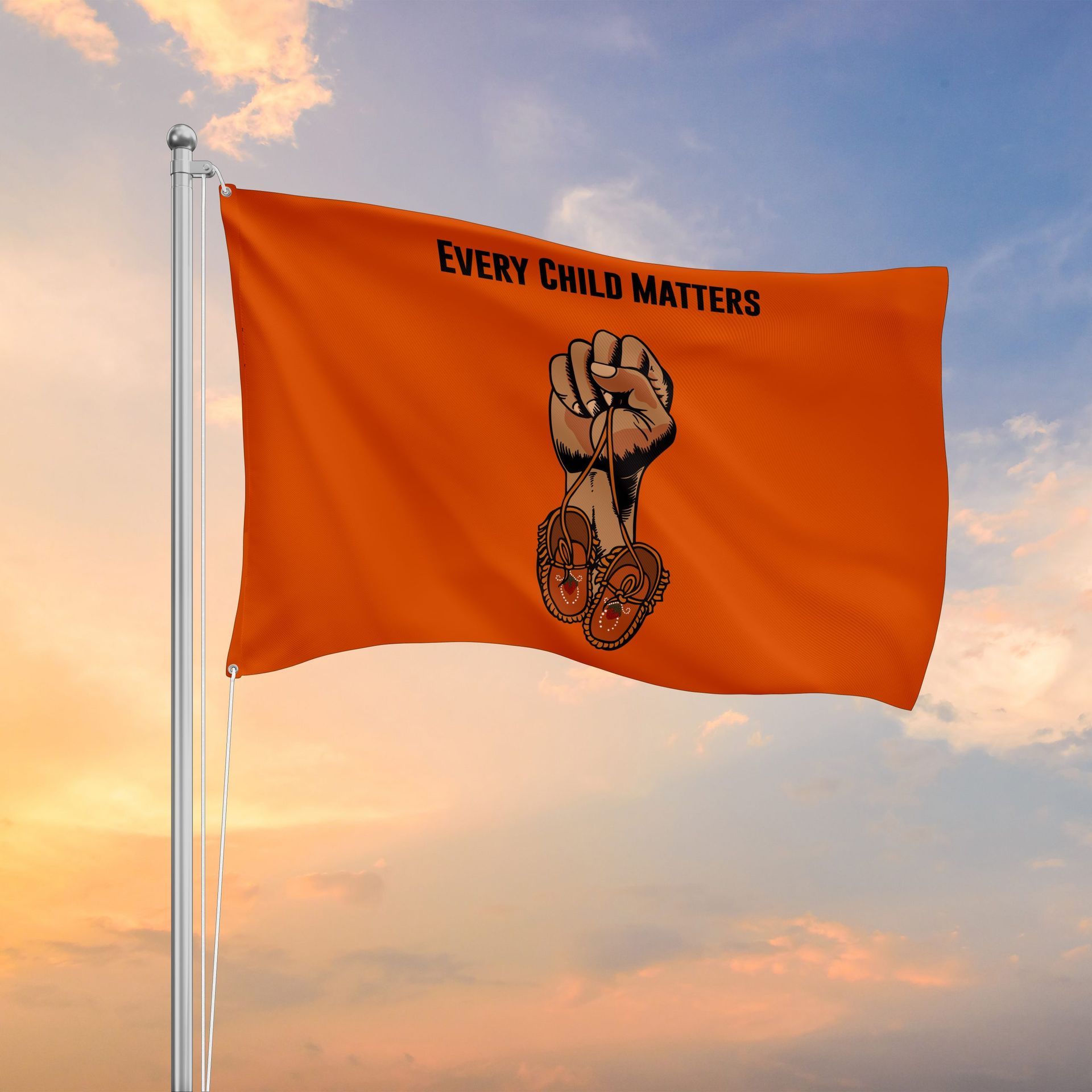 An orange flag that says every child matters