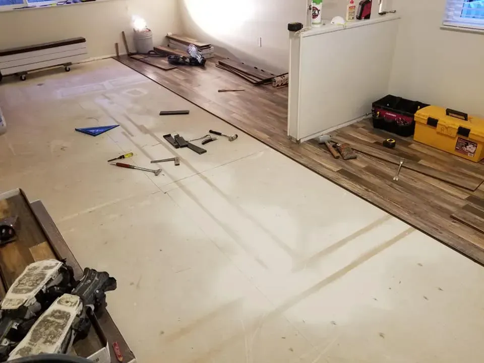 A room with a lot of tools on the floor.